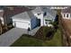 One-story house with gray roof and a landscaped yard, viewed from above at 16415 Isola Pl, Bradenton, FL 34211