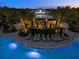 Bahama Bar at night with lights and seating at 16415 Isola Pl, Bradenton, FL 34211