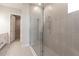 Walk-in shower with glass enclosure and modern fixtures at 16415 Isola Pl, Bradenton, FL 34211