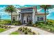 Community clubhouse with welcoming entrance and landscaping at 16415 Isola Pl, Bradenton, FL 34211