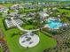 Resort-style pool with fire pit and garden beds at 16415 Isola Pl, Bradenton, FL 34211
