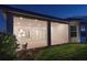 Bright covered patio with view of kitchen and sliders at 16415 Isola Pl, Bradenton, FL 34211