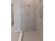 Spa-like shower with frameless glass enclosure and rainfall shower head at 16415 Isola Pl, Bradenton, FL 34211
