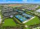 Aerial view of community tennis and pickleball courts at 16415 Isola Pl, Bradenton, FL 34211