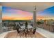 Private balcony with seating for four and city views at 1771 Ringling Blvd Blvd # 1009, Sarasota, FL 34236