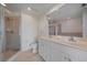 Clean bathroom with a shower, toilet, and double vanity at 1771 Ringling Blvd Blvd # 1009, Sarasota, FL 34236