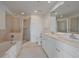 Bathroom boasts double sinks, a soaking tub, and a large shower at 1771 Ringling Blvd Blvd # 1009, Sarasota, FL 34236