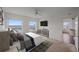 Main bedroom with city views, large windows, and a dresser at 1771 Ringling Blvd Blvd # 1009, Sarasota, FL 34236