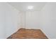 Empty bedroom with wood floors and neutral walls at 1771 Ringling Blvd Blvd # 1009, Sarasota, FL 34236