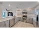 Updated kitchen with stainless steel appliances and white cabinets at 1771 Ringling Blvd Blvd # 1009, Sarasota, FL 34236