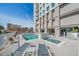 Relaxing pool and spa area with lounge chairs, perfect for resort-style living at 1771 Ringling Blvd Blvd # 1009, Sarasota, FL 34236