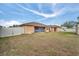 Large backyard with fenced enclosure and shed at 23039 Worth Ave, Port Charlotte, FL 33954