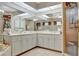 Large bathroom with double vanity, corner bathtub, and shower at 23039 Worth Ave, Port Charlotte, FL 33954