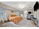 Comfortable bedroom featuring a king-size bed and a workspace at 23039 Worth Ave, Port Charlotte, FL 33954