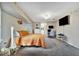 Bright bedroom with a king-size bed and an ensuite bathroom at 23039 Worth Ave, Port Charlotte, FL 33954