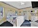 Bedroom with queen bed, white dresser, and ocean decor at 23039 Worth Ave, Port Charlotte, FL 33954