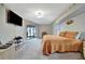 Spacious bedroom with king-size bed and sliding doors to patio at 23039 Worth Ave, Port Charlotte, FL 33954