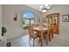 Dining room with wood table and large window at 23039 Worth Ave, Port Charlotte, FL 33954