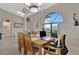 Bright dining room with wood table and chairs at 23039 Worth Ave, Port Charlotte, FL 33954