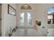 Bright entryway with tile flooring and double doors at 23039 Worth Ave, Port Charlotte, FL 33954