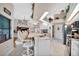 Modern kitchen with white cabinets, granite counters, and stainless steel appliances at 23039 Worth Ave, Port Charlotte, FL 33954