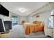 Spacious main bedroom with king bed and access to patio at 23039 Worth Ave, Port Charlotte, FL 33954