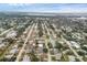 Wide aerial view of neighborhood, showcasing home's location at 2430 Sunnyside Ln, Sarasota, FL 34239