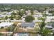 Aerial view showing house, pool, and surrounding neighborhood at 2430 Sunnyside Ln, Sarasota, FL 34239