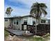 Mobile home with deck and bicycle at 2601 Gulf N Dr # 510, Bradenton Beach, FL 34217