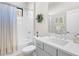 Bathroom with shower/tub combo and vanity at 26768 Weiskopf Dr, Englewood, FL 34223