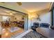 Relaxing Florida room with sliding glass doors leading to the outdoors and comfortable seating at 277 Sherwood Dr # 277D, Bradenton, FL 34210