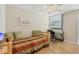Guest bedroom with daybed, desk and chair, and plenty of natural light at 277 Sherwood Dr # 277D, Bradenton, FL 34210