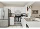Bright kitchen with stainless steel appliances at 277 Sherwood Dr # 277D, Bradenton, FL 34210