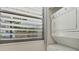 Stackable washer and dryer in a compact laundry room at 277 Sherwood Dr # 277D, Bradenton, FL 34210