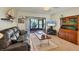 Living room with leather couch and wood coffee table at 277 Sherwood Dr # 277D, Bradenton, FL 34210