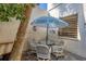 Small patio with bistro table and chairs at 277 Sherwood Dr # 277D, Bradenton, FL 34210
