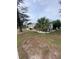 House with side yard and mature landscaping at 2928 Bahia Vista St, Sarasota, FL 34239