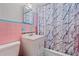 Clean bathroom with pink tile and a shower/tub combo at 2928 Bahia Vista St, Sarasota, FL 34239