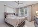 Well-lit bedroom with a queen bed and ample closet space at 2928 Bahia Vista St, Sarasota, FL 34239