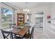 Cozy dining area with wooden table and four chairs at 2928 Bahia Vista St, Sarasota, FL 34239