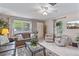 Spacious living room with ample natural light and comfortable seating at 2928 Bahia Vista St, Sarasota, FL 34239