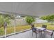 Covered patio with seating area, overlooking backyard at 2928 Bahia Vista St, Sarasota, FL 34239