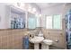 Clean bathroom with pedestal sink and shower at 327 Hernando Ave, Sarasota, FL 34243
