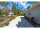 Long gravel driveway leading to the house at 327 Hernando Ave, Sarasota, FL 34243