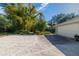 Detached garage with gravel parking area at 327 Hernando Ave, Sarasota, FL 34243
