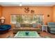 Relaxing living area with ample natural light and seating at 327 Hernando Ave, Sarasota, FL 34243