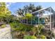 Landscaped garden path leading to the pool at 327 Hernando Ave, Sarasota, FL 34243