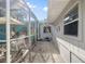 Pathway between house and screened enclosure at 327 Hernando Ave, Sarasota, FL 34243