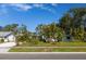 House exterior view from across the street, showing landscaping and driveway at 327 Hernando Ave, Sarasota, FL 34243