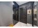 Stylish bathroom with dark cabinetry and marble flooring at 340 S Palm Ave # Pl1, Sarasota, FL 34236